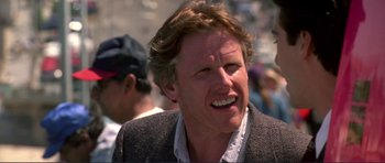 Movie still from “Point Break” (1991), directed by Kathryn Bigelow – A person wearing a jacket; Close Up shot, Low angle