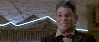 Movie still from “Point Break” (1991), directed by Kathryn Bigelow – A person wearing a mask; Close Up shot, Low angle