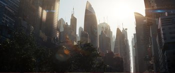 Movie still from “Pokémon: Detective Pikachu” (2019), directed by Rob Letterman – A view of a city skyline with a clock on it's face; Extreme Wide shot, High angle