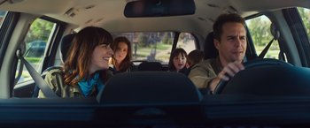Movie still from “Poltergeist” (2015), directed by Gil Kenan – A group of people sitting in the back of a car; Medium shot, Over the shoulder angle