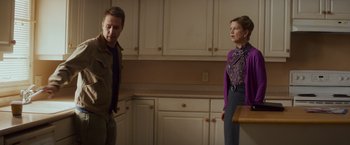 Movie still from “Poltergeist” (2015), directed by Gil Kenan – A man and a woman standing in a kitchen; Medium shot, Over the shoulder angle