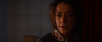 Movie still from “Poltergeist” (2015), directed by Gil Kenan – A person looking at the camera; Close Up shot, Over the shoulder angle