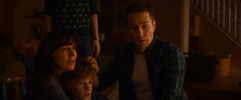 Movie still from “Poltergeist” (2015), directed by Gil Kenan – A man and a woman are combing a boy's hair; Close Up shot, Over the shoulder angle