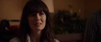 Movie still from “Poltergeist” (2015), directed by Gil Kenan – A person wearing a white shirt; Close Up shot, Over the shoulder angle