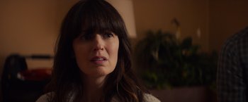 Movie still from “Poltergeist” (2015), directed by Gil Kenan – A person with long brown hair; Close Up shot, Over the shoulder angle