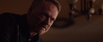 Movie still from “Poltergeist” (2015), directed by Gil Kenan – A person looking at the camera; Close Up shot, Over the shoulder angle