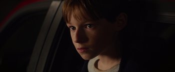 Movie still from “Poltergeist” (2015), directed by Gil Kenan – A young boy is looking into the camera; Close Up shot, High angle