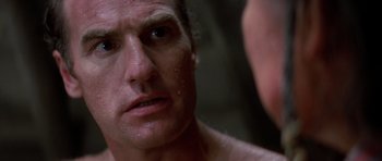 Movie still from “Poltergeist II: The Other Side” (1986), directed by Brian Gibson – A man's face in a mirror; Close Up shot, Over the shoulder angle