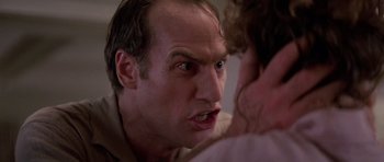 Movie still from “Poltergeist II: The Other Side” (1986), directed by Brian Gibson – A person with his mouth wide open; Close Up shot, Low angle