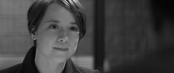 Movie still from “Polytechnique” (2009), directed by Denis Villeneuve – Black and white photograph of a woman with short hair; Close Up shot, Over the shoulder angle