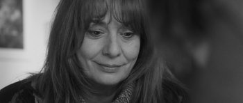 Movie still from “Polytechnique” (2009), directed by Denis Villeneuve – A person with long hair; Close Up shot, Over the shoulder angle