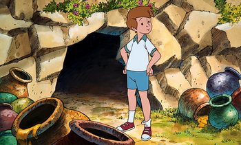 Movie still from “Pooh's Grand Adventure: The Search for Christopher Robin” (1997), directed by Karl Geurs – A boy standing in front of an entrance to a cave; Medium shot, High angle