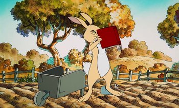 Movie still from “Pooh's Grand Adventure: The Search for Christopher Robin” (1997), directed by Karl Geurs – A cartoon of a rabbit carrying a book; Medium shot, High angle