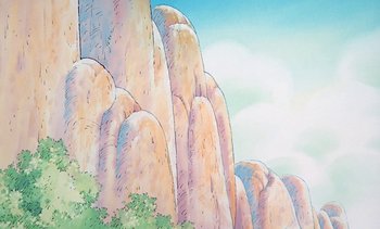 Movie still from “Pooh's Grand Adventure: The Search for Christopher Robin” (1997), directed by Karl Geurs – A painting of a large rock formation on a hill; Extreme Wide shot, High angle