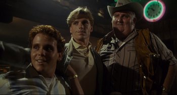 Movie still from “Porky's” (1981), directed by Bob Clark – A group of men standing next to each other; Close Up shot, Low angle