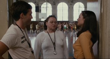 Movie still from “Porky's” (1981), directed by Bob Clark – A group of people standing in front of a crowd; Medium shot, Over the shoulder angle