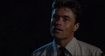 Movie still from “Porky's” (1981), directed by Bob Clark – A person wearing a shirt and tie; Close Up shot, Low angle