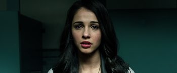 Movie still from “Power Rangers” (2017), directed by Dean Israelite – A person with long black hair; Close Up shot, Over the shoulder angle