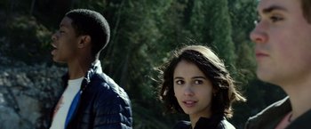Movie still from “Power Rangers” (2017), directed by Dean Israelite – A young woman standing in front of a man; Close Up shot, Over the shoulder angle