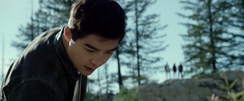Movie still from “Power Rangers” (2017), directed by Dean Israelite – A young man is looking down at the ground; Close Up shot, Low angle