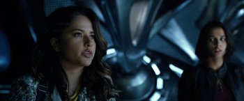 Movie still from “Power Rangers” (2017), directed by Dean Israelite – A beautiful young woman with long brown hair; Close Up shot, Over the shoulder angle