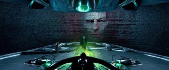 Movie still from “Power Rangers” (2017), directed by Dean Israelite – A man is standing in front of a brick wall; Extreme Wide shot, Over the shoulder angle