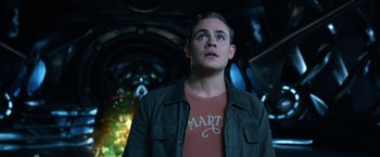 Movie still from “Power Rangers” (2017), directed by Dean Israelite – A young man looking up into the air; Close Up shot, Low angle