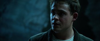 Movie still from “Power Rangers” (2017), directed by Dean Israelite – A person wearing a white shirt; Close Up shot, Over the shoulder angle