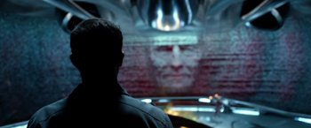 Movie still from “Power Rangers” (2017), directed by Dean Israelite – A man is looking at a wall in a room; Close Up shot, Over the shoulder angle