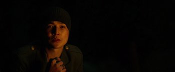 Movie still from “Power Rangers” (2017), directed by Dean Israelite – A man in a black jacket and a beanie; Close Up shot, Low angle
