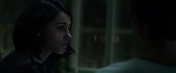 Movie still from “Power Rangers” (2017), directed by Dean Israelite – A young woman is looking into the distance; Close Up shot, Over the shoulder angle