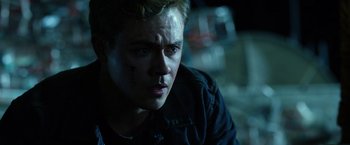 Movie still from “Power Rangers” (2017), directed by Dean Israelite – A young man is looking into the distance; Close Up shot, Low angle