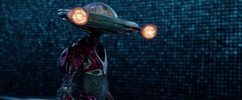 Movie still from “Power Rangers” (2017), directed by Dean Israelite – The head of a robot with lights on it; Close Up shot, High angle