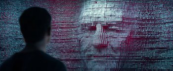 Movie still from “Power Rangers” (2017), directed by Dean Israelite – A man is seen through a curtain of red and white squares; Extreme Close Up shot, Over the shoulder angle