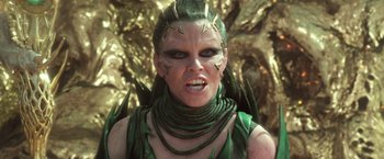 Movie still from “Power Rangers” (2017), directed by Dean Israelite – A person wearing a costume; Close Up shot, Low angle