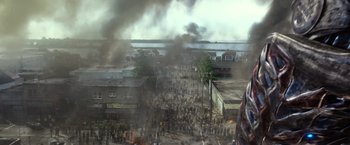 Movie still from “Power Rangers” (2017), directed by Dean Israelite – An aerial view of a large crowd of people in a city; Wide shot, High angle