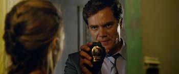 Movie still from “Premium Rush” (2012), directed by David Koepp – A man that is taking a picture of himself; Close Up shot, Over the shoulder angle