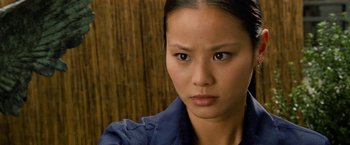 Movie still from “Premium Rush” (2012), directed by David Koepp – A person wearing a blue shirt; Close Up shot, High angle