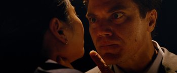 Movie still from “Premium Rush” (2012), directed by David Koepp – A man and a woman looking at each other; Extreme Close Up shot, Low angle