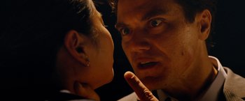 Movie still from “Premium Rush” (2012), directed by David Koepp – A man and a woman face to face in front of each other; Close Up shot, Low angle