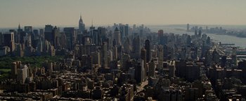 Movie still from “Premium Rush” (2012), directed by David Koepp – A view of a large city from a helicopter; Extreme Wide shot, High angle