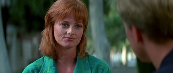 Movie still from “Prince of Darkness” (1987), directed by John Carpenter – A person wearing a green shirt; Close Up shot, Low angle