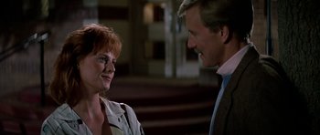 Movie still from “Prince of Darkness” (1987), directed by John Carpenter – A man and a woman talking to each other; Close Up shot, Over the shoulder angle