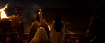 Movie still from “Prince of Persia: The Sands of Time” (2010), directed by Mike Newell – A group of people standing next to each other on top of a hill; Wide shot, High angle