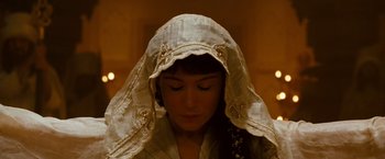 Movie still from “Prince of Persia: The Sands of Time” (2010), directed by Mike Newell – A woman wearing a white veil and a white dress; Close Up shot, High angle