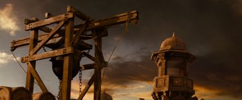 Movie still from “Prince of Persia: The Sands of Time” (2010), directed by Mike Newell – An image of an old wooden crane in the middle of the night; Wide shot, Low angle