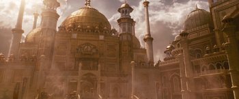 Movie still from “Prince of Persia: The Sands of Time” (2010), directed by Mike Newell – A very large building with a very tall dome; Extreme Wide shot, Low angle