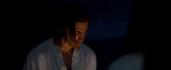 Movie still from “Prince of Persia: The Sands of Time” (2010), directed by Mike Newell – A person wearing a robe; Close Up shot, Over the shoulder angle