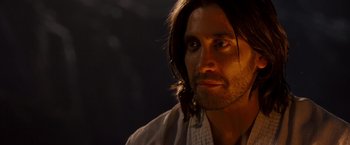 Movie still from “Prince of Persia: The Sands of Time” (2010), directed by Mike Newell – A person with long brown hair; Close Up shot, Over the shoulder angle