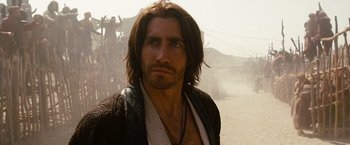 Movie still from “Prince of Persia: The Sands of Time” (2010), directed by Mike Newell – A person with long hair; Close Up shot, Low angle